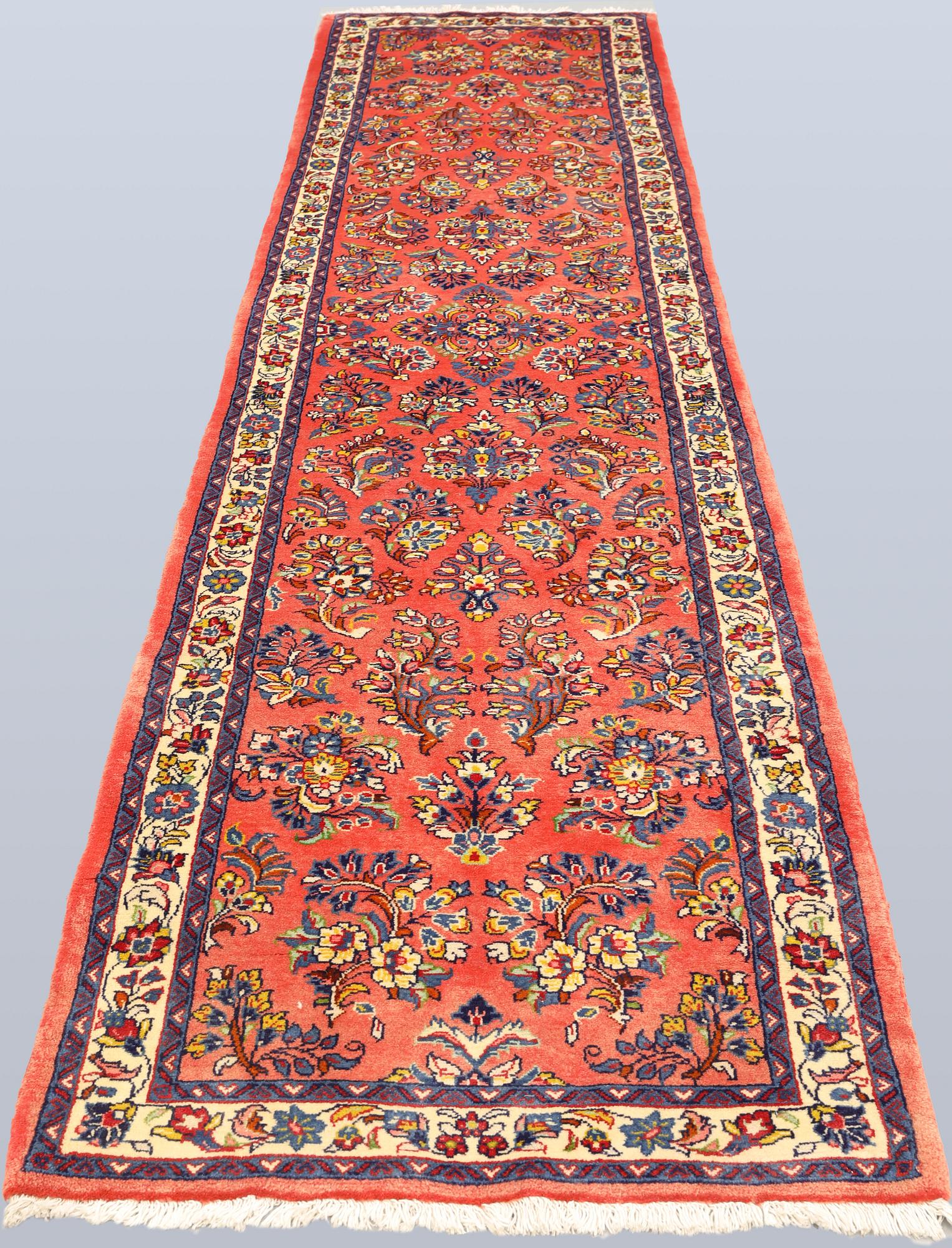 A Saruk runner carpet, 358 x 78 cm.