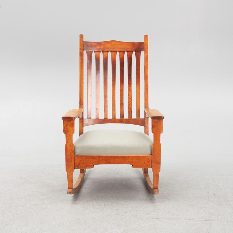Gustav Stickley, after. A 'Bungalow Rocker' rocking chair, early 20th Century.