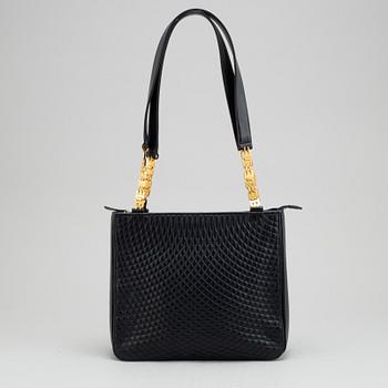 Bally, a navy leather handbag.