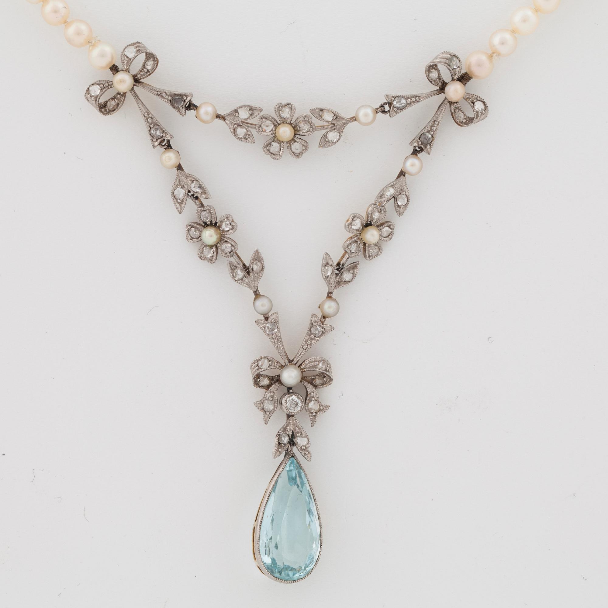 A circa 6.00 ct aquamarine, rose cut diamond and pearl necklace.