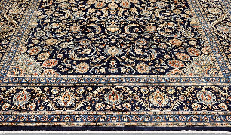 A Kashmar carpet, ca 340 x 253 cm.
