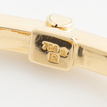 Bangle with onyx and brilliant-cut diamonds.