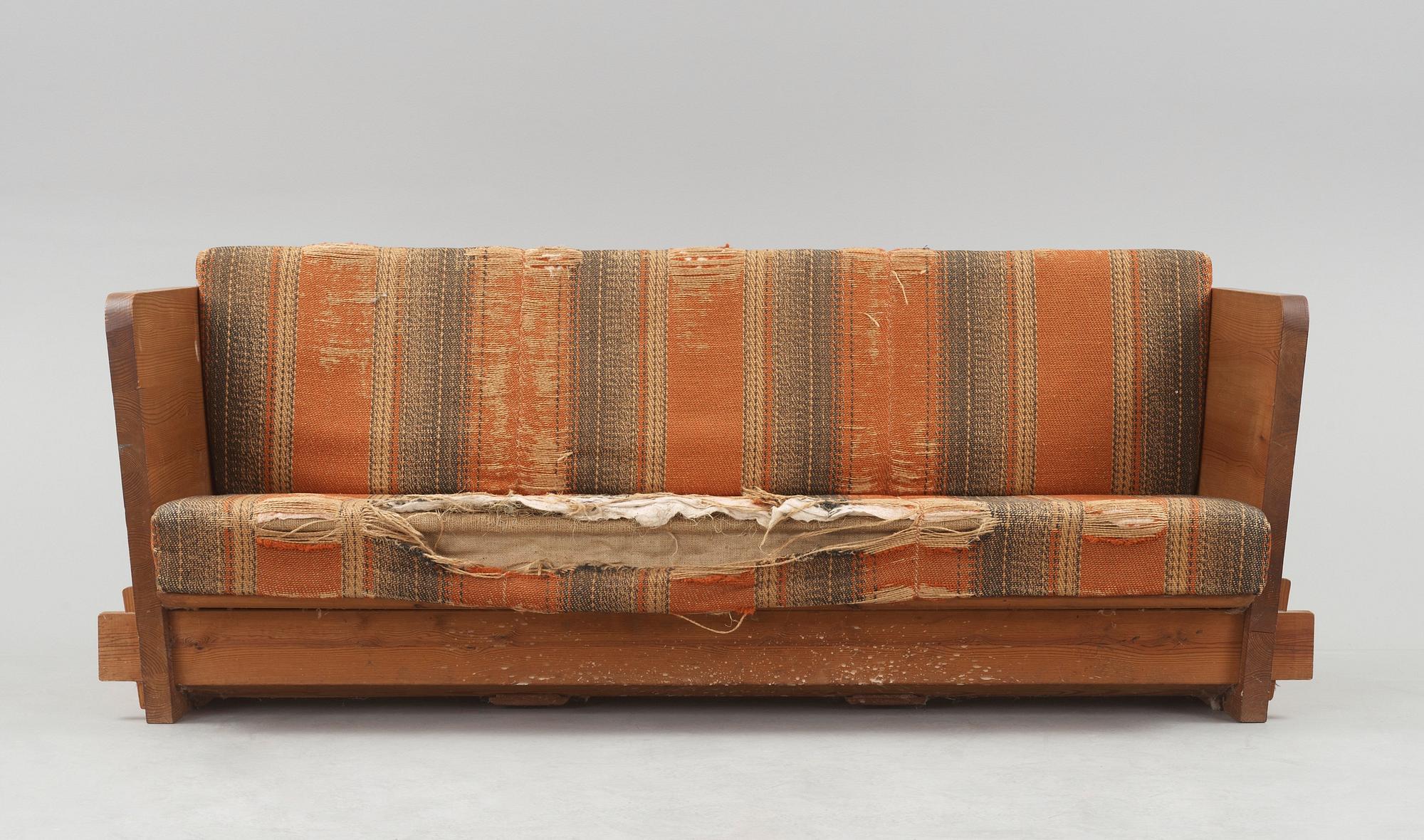Axel Einar Hjorth, a 'Lovö' stained pine sofa, Nordiska Kompaniet, Sweden 1930's.