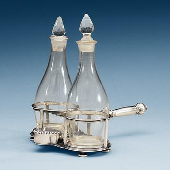 917. A German early 18th century silver cruet-set, makers mark of  Johann P. Riblinger, Augsburg 1708-1710.