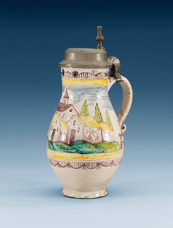 A German pewter mounted faience tankard, 18th Century.