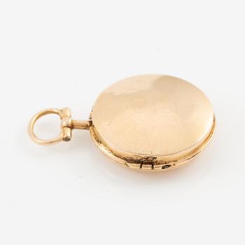 Medaljong 18K guld.