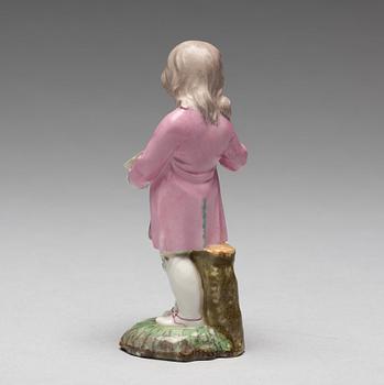 A Höchst porcelain figure of a boy, 1770's.