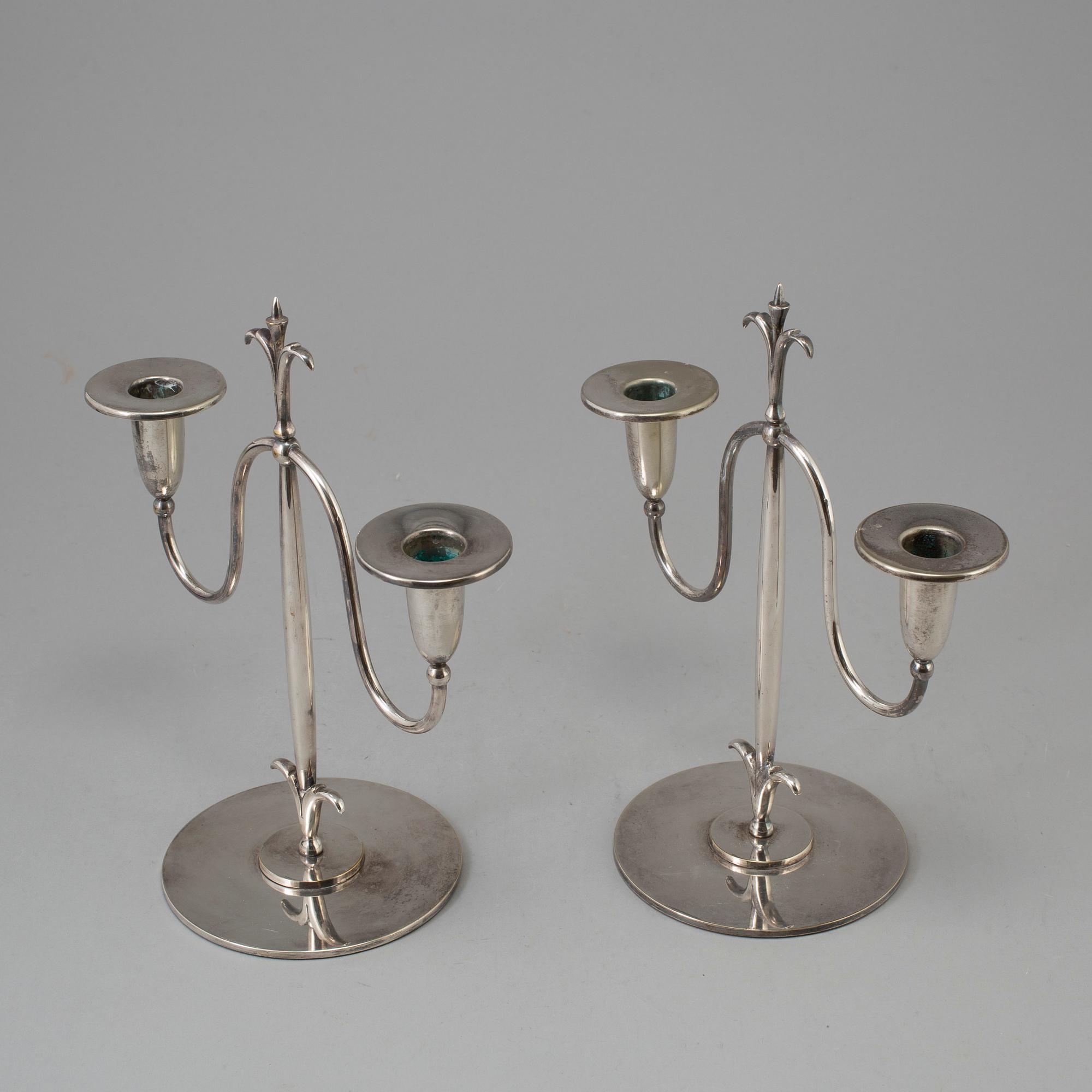 a pair of Elis Bergh silver plated candelabras, Swedish grace, CG Hallberg, Stockholm, 1920s.