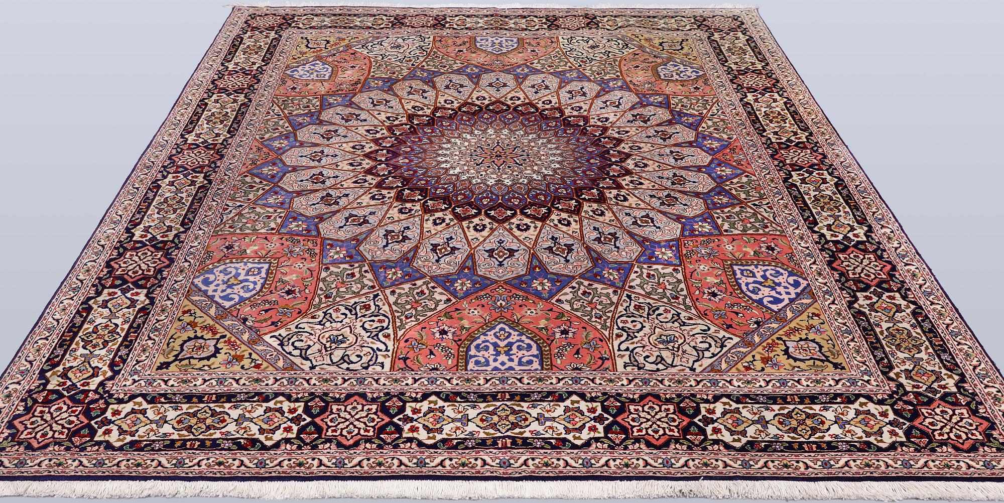 A Tabriz carpet, part silk, so-called 50 Raj, approx. 255 x 200 cm.