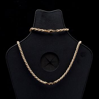 HALS- och ARMKED, tvåfärgsguld 18K, italienska stämplar. Vikt 37,9 g.
