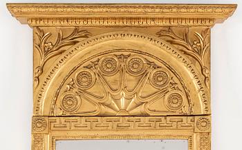 A Swedish Empire mirror, early 19th century.