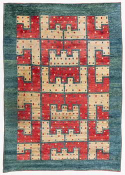 A loomed carpet, Tibet/Nepal, c. 295 x 210 cm.
