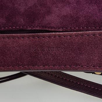 Louis Vuitton, a Monogram Empreinte 'Audacieuse' bag.