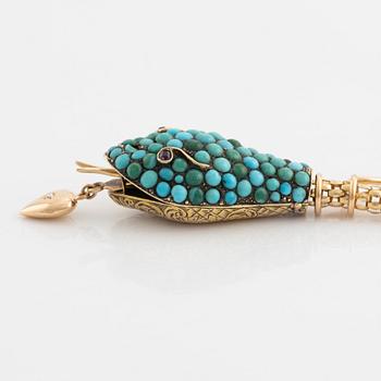 Necklace in gold in the shape of a serpent with turquoise and rubies.