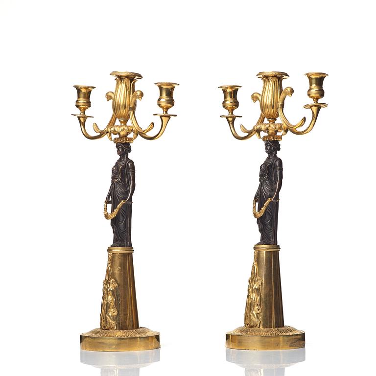 A pair of Empire 19th century three-light candelabra,  Russia.