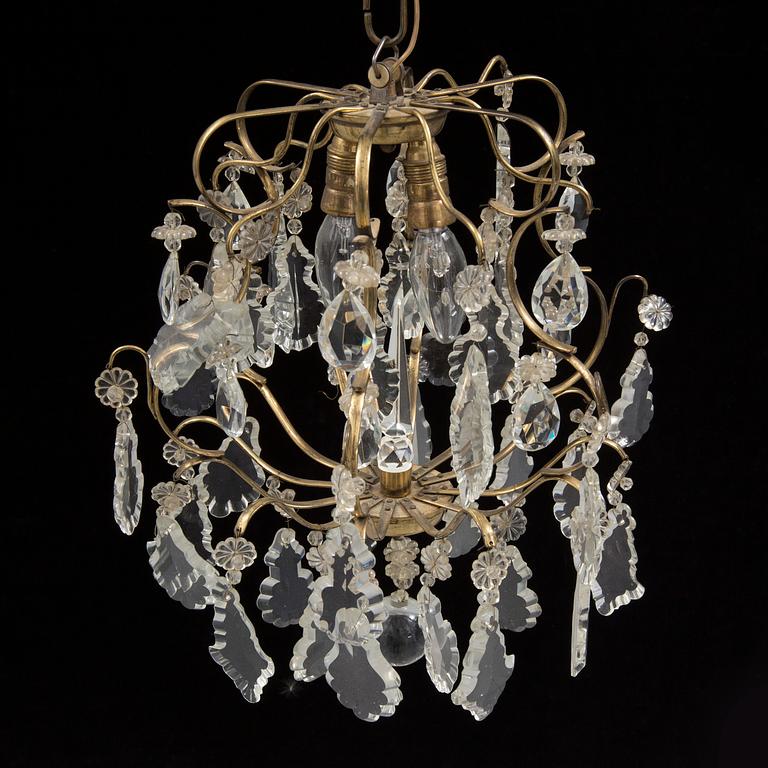 A BAROQUE STYLE CEILING LIGHT, first half of the 20th century. Height ca 45 cm.