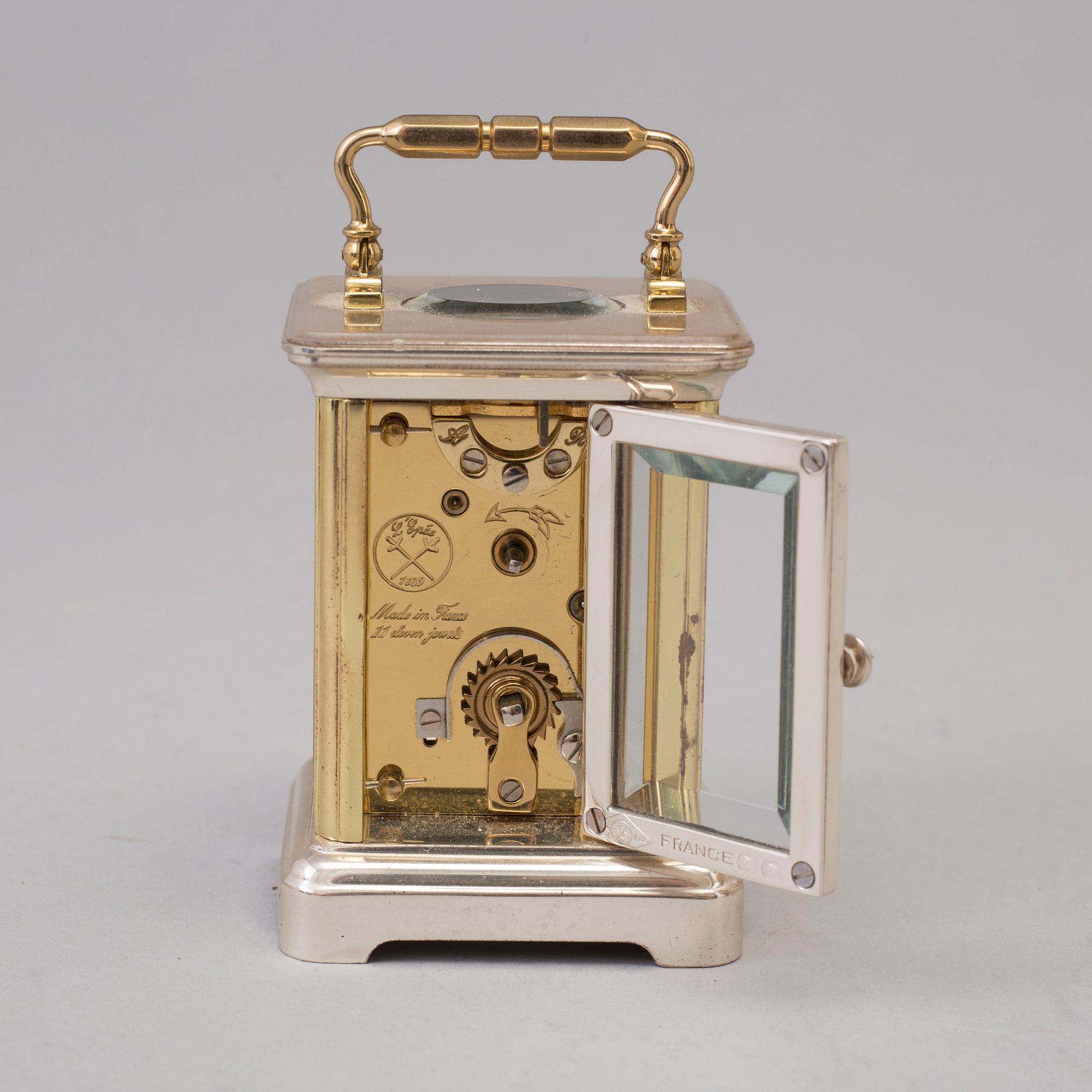 L´EPÉE, Fondée en 1839, travel alarm clock, lever escapement, second half of the 20th century.
