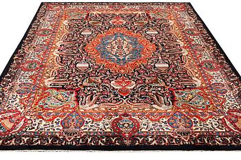 A Kashmar carpet, c. 390 x 305 cm.