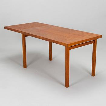 A mid-20th century teak veneered table.