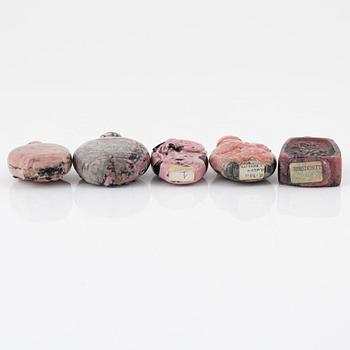 Nine Chinese snuff bottles in mottled stone, 20th century.