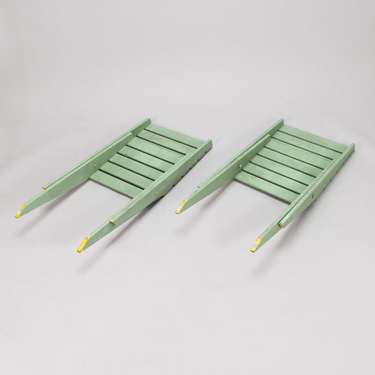 A pair of mid-20th century garden chairs.