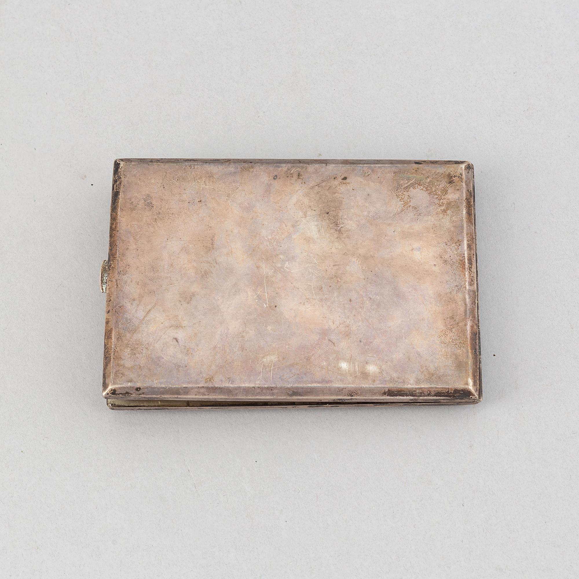 A Viennese silver cigarette case with a minature painting, Austria, around the year 1900.