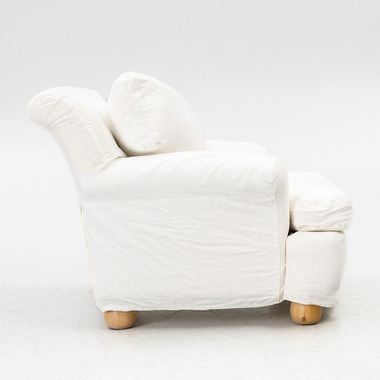 An armchair, contemporary.