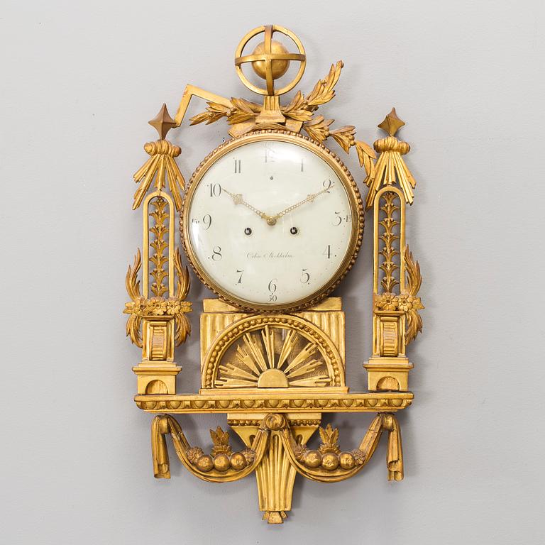 A swedish gustavian wall clock signed by Carl Erik Orbin, Stockholm, active ca 1774-1799.