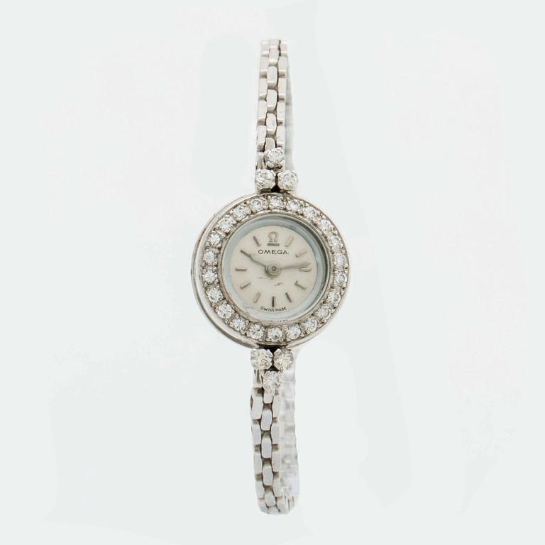 OMEGA ladies wristwatch, 15 mm, 18K whitegold, brilliant-cut diamonds approx 0,40 ct in total.
