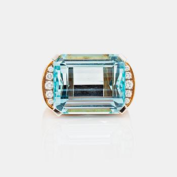 A aquamarine, circa 23.00 cts, and brilliant-cut diamond ring.