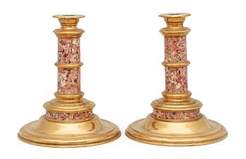 A pair of Swedish late 19th century Garbergsgranitell candlesticks.