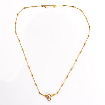 BJÖRN WECKSTRÖM, KAULAKORU "Cheek to cheek", 14K kultaa, viljellyt helmet. Lapponia 1988.