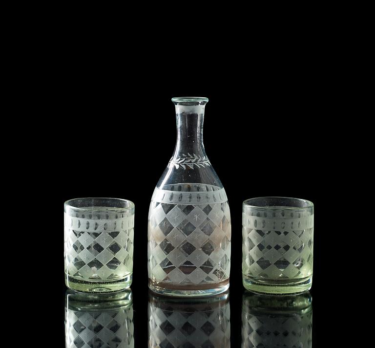 A set of 12 Swedish glasses and a bottle, 19th Century.