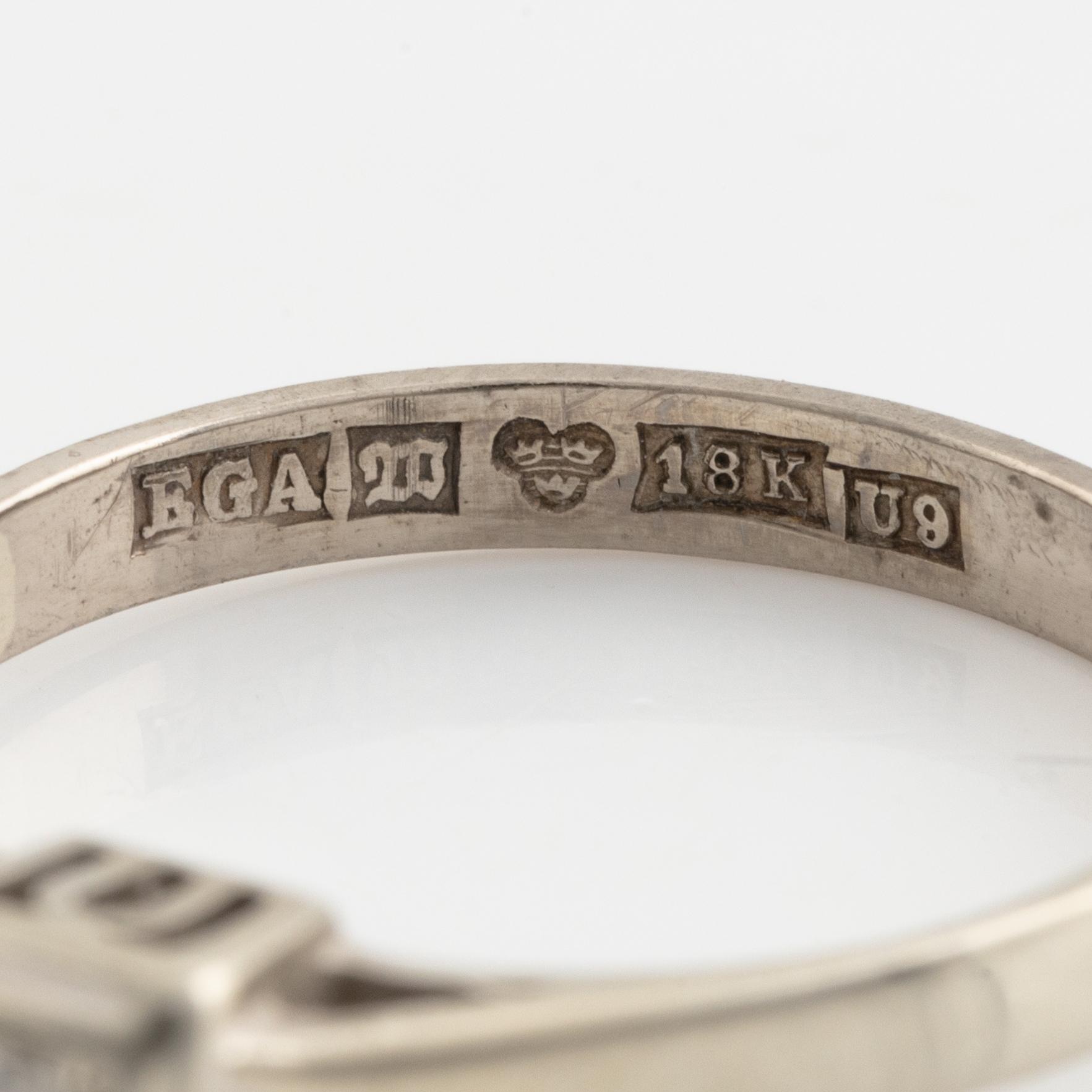White gold and brilliant cut diamond ring.