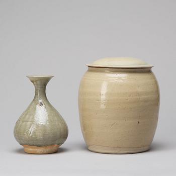 A celadon glazed jar with cover and a vase, South East Asia, 16/17th Century.