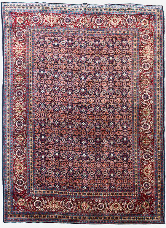 A carpet, a semi-antique Tabriz, ca 357 x 255 cm.