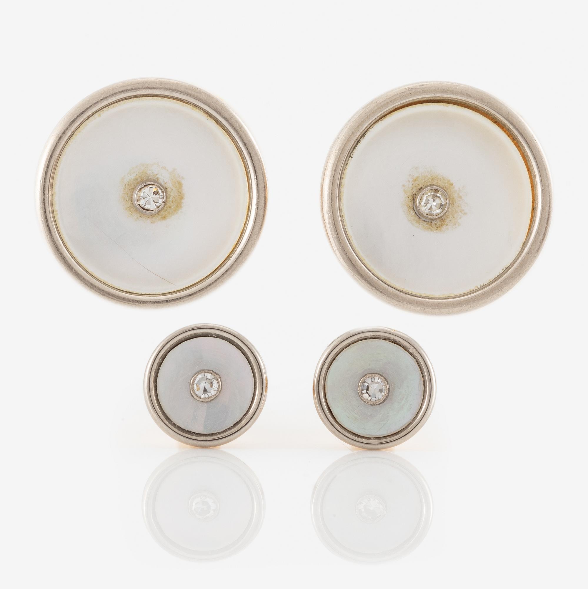 C.G Hallberg, cufflinks and shirt studs, two pairs, 18K gold with diamonds and mother-of-pearl.