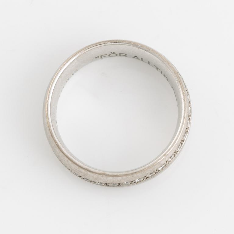 White gold and brilliant cut diamond ring.