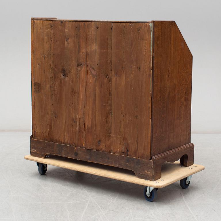 A mid 18th century oak secretaire.