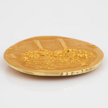 A Swedish commemorative medal in 18K gold.