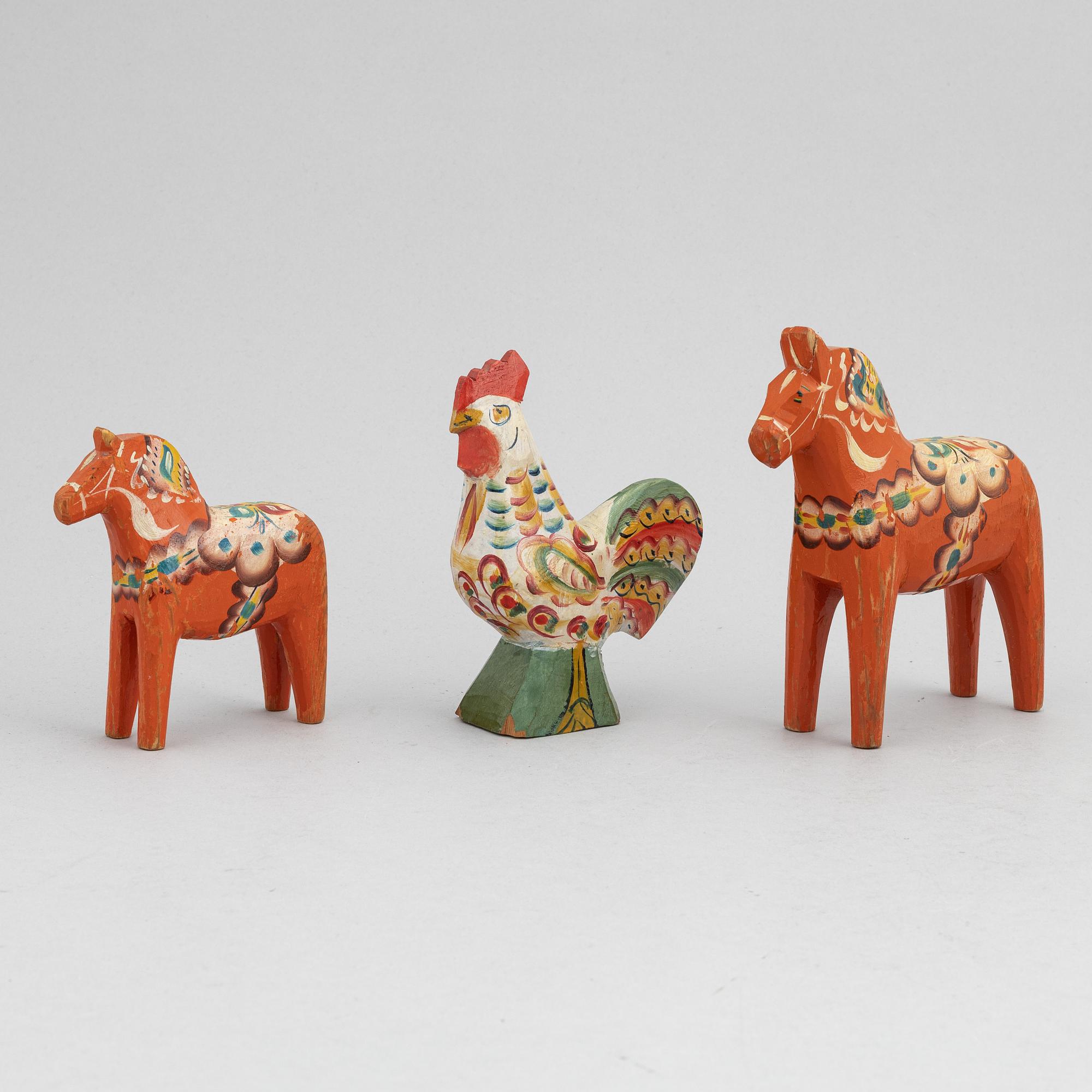 A set of painted wooden horses and roosters from Dalarna, Sweden, mid 20th century and late 20th century.