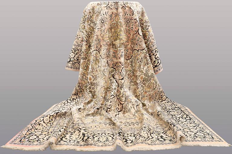 A CARPET, old silk Kashmir, ca 380 x 274 cm.