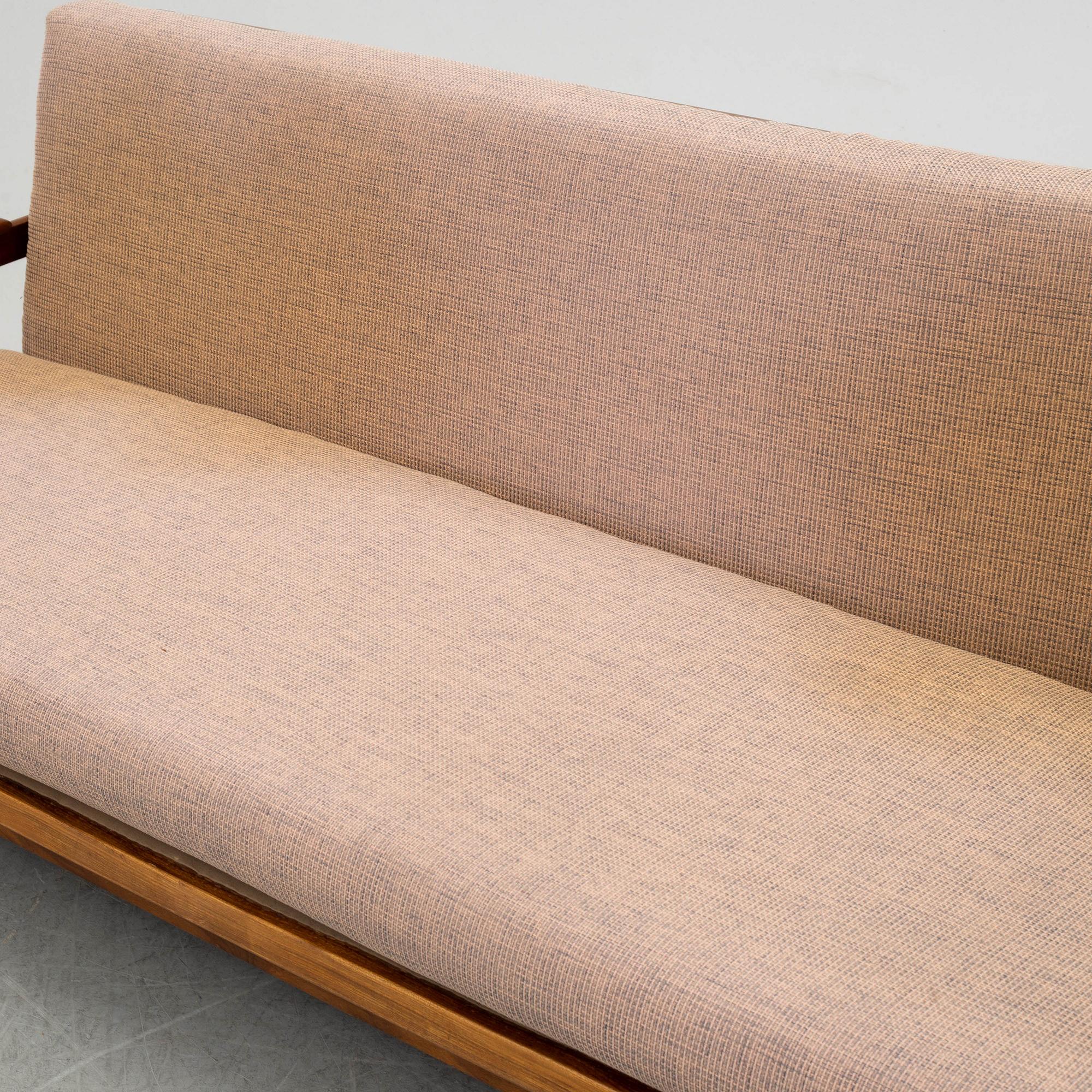 George Fejer & Eric Phamphilan, a British 'Manhattan' sofa and two easy chaits from Guy Rogers, 1960's.