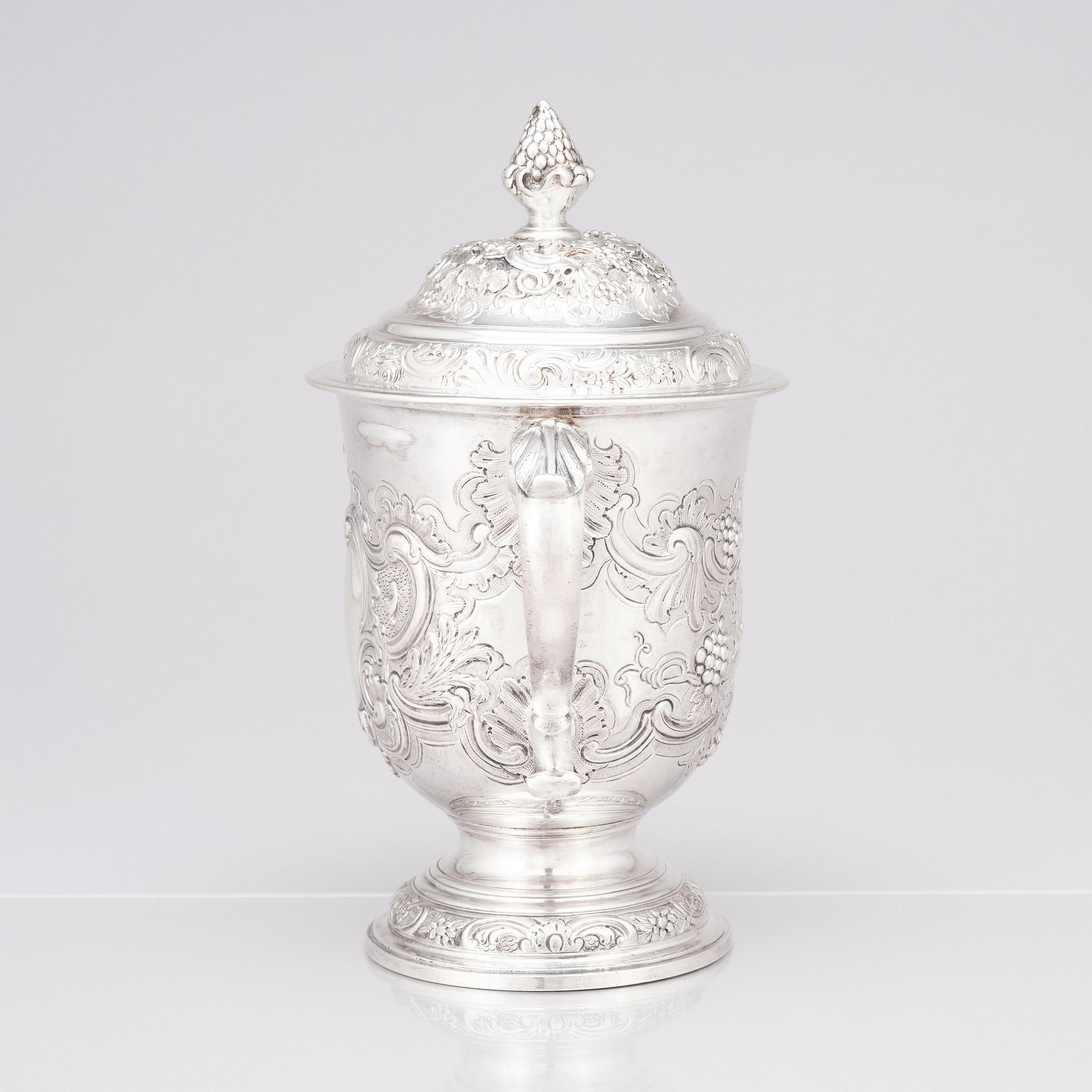 An English mid 18th century silver cup with lid, marks of Francis Crump, London.