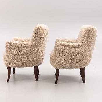 A pair of Swedish Modern armchairs, mid 20th century.