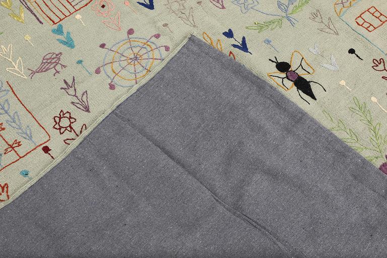 A kilim carpet with hand-embroidered decoration, 235 x 178 cm.