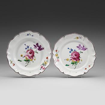 A pair of Swedish faience dinner plates, Marieberg, dated 23/6 (17)74.