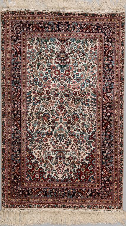 A RUG, silk China 122 x 76 cm.