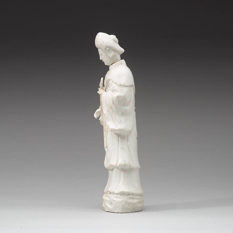 A blanc de chine figure of a court attendant, Qing dynasty, Kangxi ca 1690.