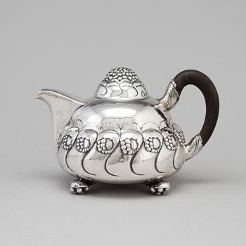 A Danish Art Nouveau silver teapot, maker's mark EVALD NIELSEN, Copenhagen, 1919.